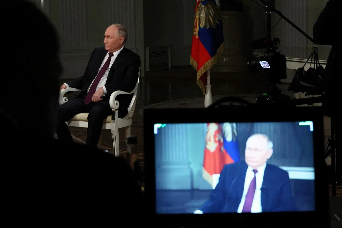 FILE PHOTO: Russian President Vladimir Putin listens during an interview with U.S. television host Tucker Carlson in Moscow, Russia February 6, 2024. Sputnik/Gavriil Grigorov/Kremlin via REUTERS