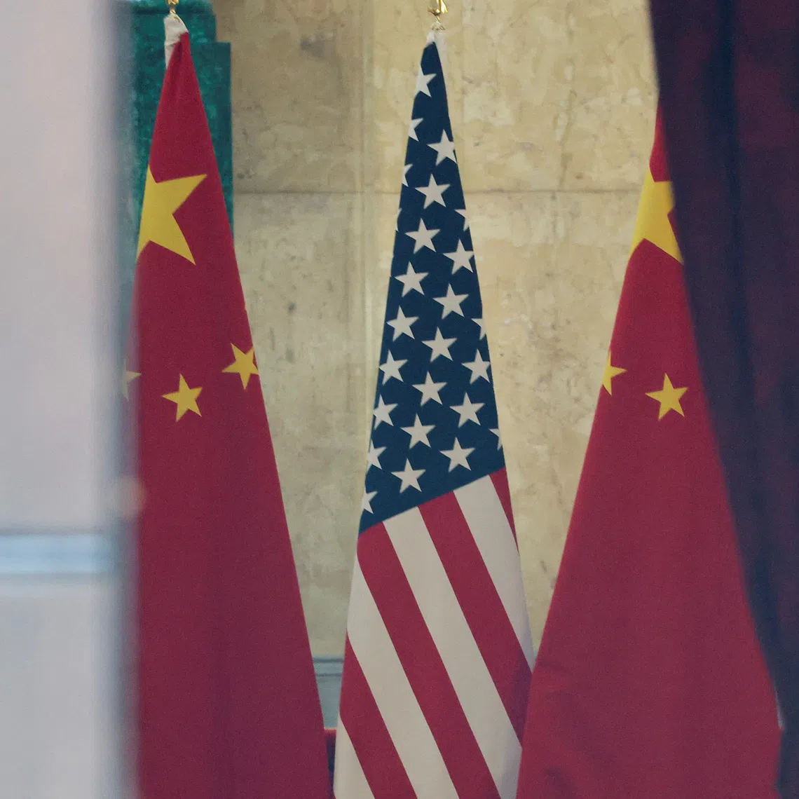 U.S. and China flags are pictured at Lancaster House, on the second day scheduled for trade talks between the U.S. and China, in London, Britain, June 10, 2025. REUTERS/Toby Melville