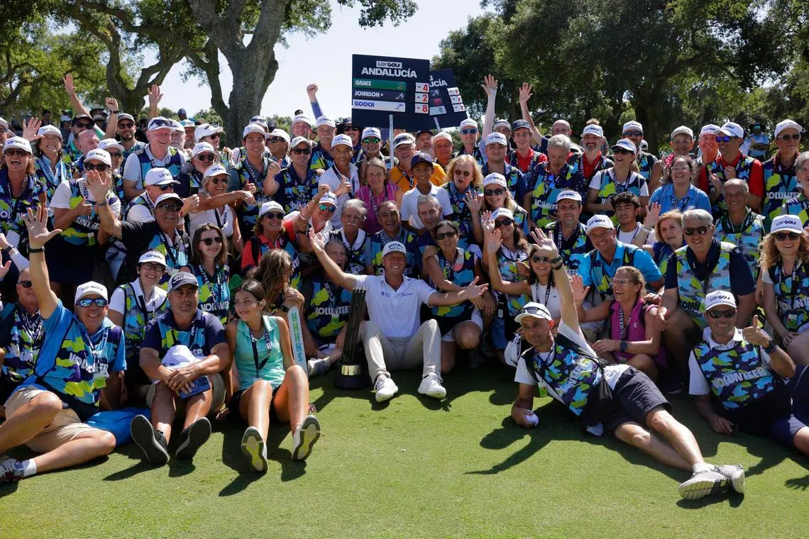 Golf - LIV Golf - Andalucia - Real Club Valderrama, Sotogrande, Spain - July 13, 2025 Smash GC's Talor Gooch celebrates with spectators after winning the LIV Golf Andalucia REUTERS/Jon Nazca