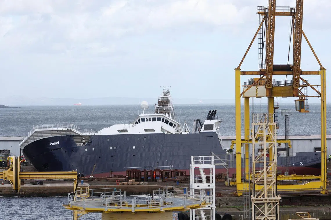Research vessel Petrel tipped over in high winds at a dry dock in the Scottish capital.