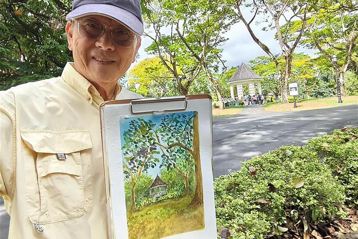 Veteran volunteer artist Tham Pui San teaches small groups at the Botanic Gardens. 