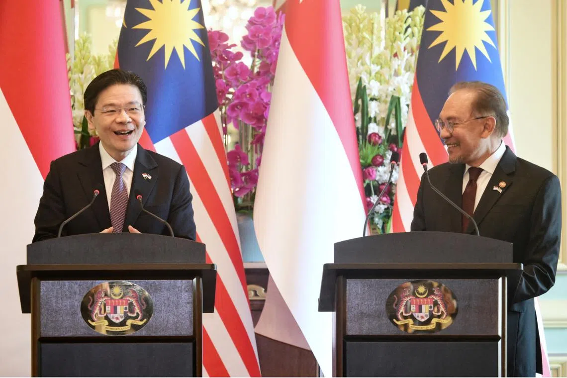 PM Lawrence Wong and Malaysian PM Anwar Ibrahim exchanged an agreement on the Johor-Singapore Special Economic Zone on Jan 7.