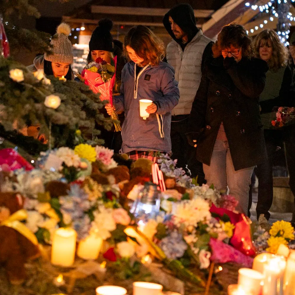 Locals mourn the victims of one of Canada's worst-ever mass shootings at a vigil at Tumbler Ridge Secondary School on Feb 11, one day after the tragic attack.
