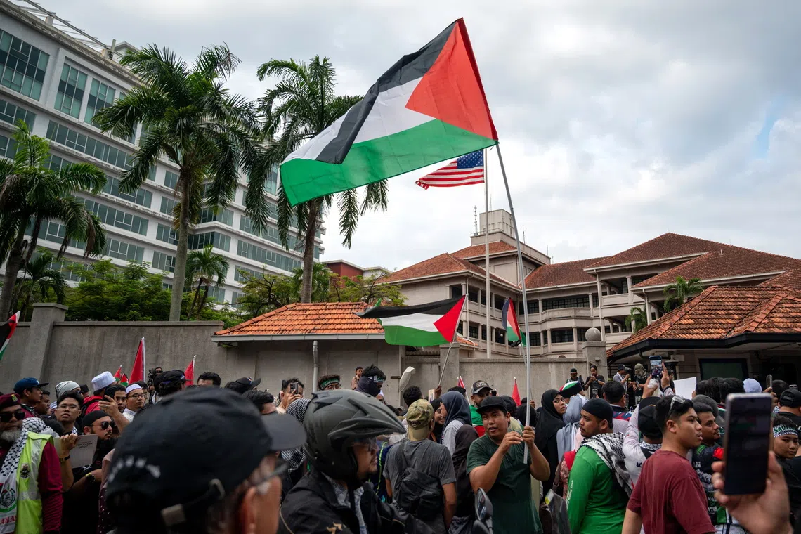 A demonstration in Kuala Lumpur on Oct 2 against Israeli forces' interception of vessels from the Global Sumud Flotilla and the detention of Malaysian activists.