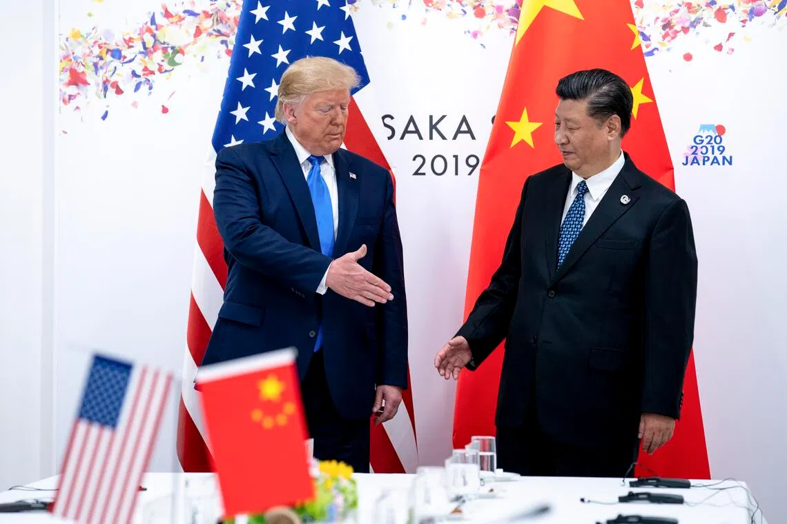 US President Donald Trump and Chinese President Xi Jinping at the Osaka G-20 summit in 2019 during Mr Trump’s first term in office. 