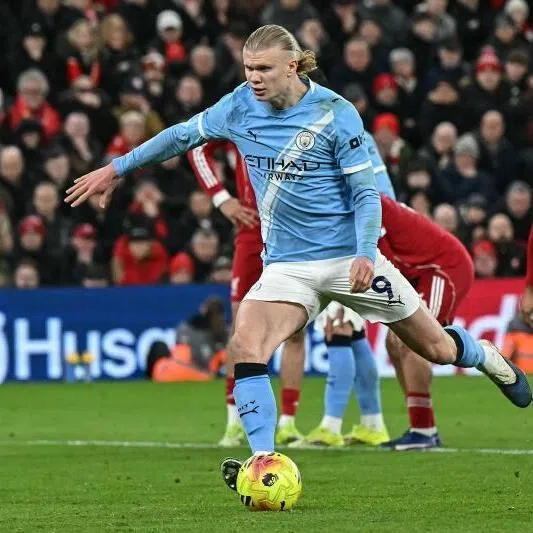 Manchester City's striker Erling Haaland (centre) scores his team's second goal in Liverpool, England, on Feb 8.