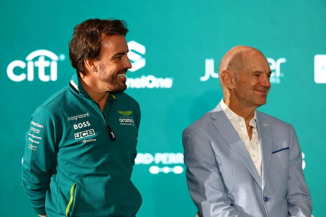 Aston Martin's Fernando Alonso (left) with new managing technical partner Adrian Newey during the press conference.