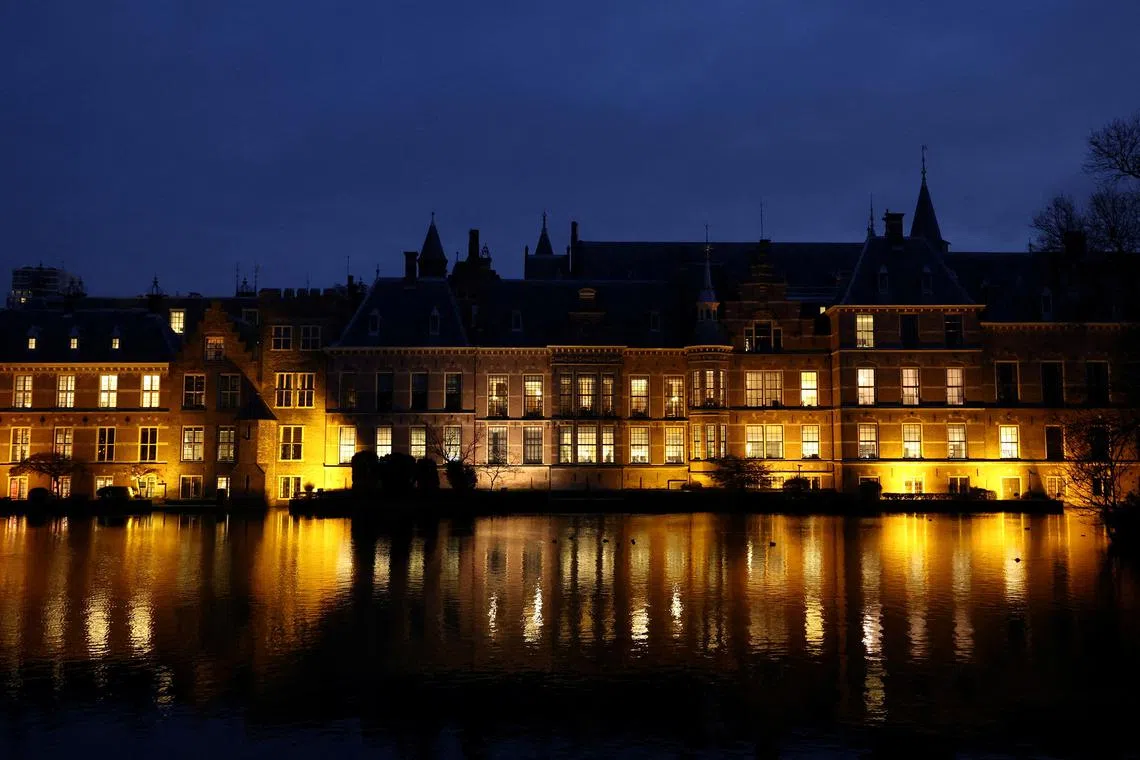 FILE PHOTO: Lights illuminate at the Dutch Parliament building, ahead of the Dutch parliamentary election, in The Hague, Netherlands, November 21, 2023. REUTERS/Yves Herman/File Photo