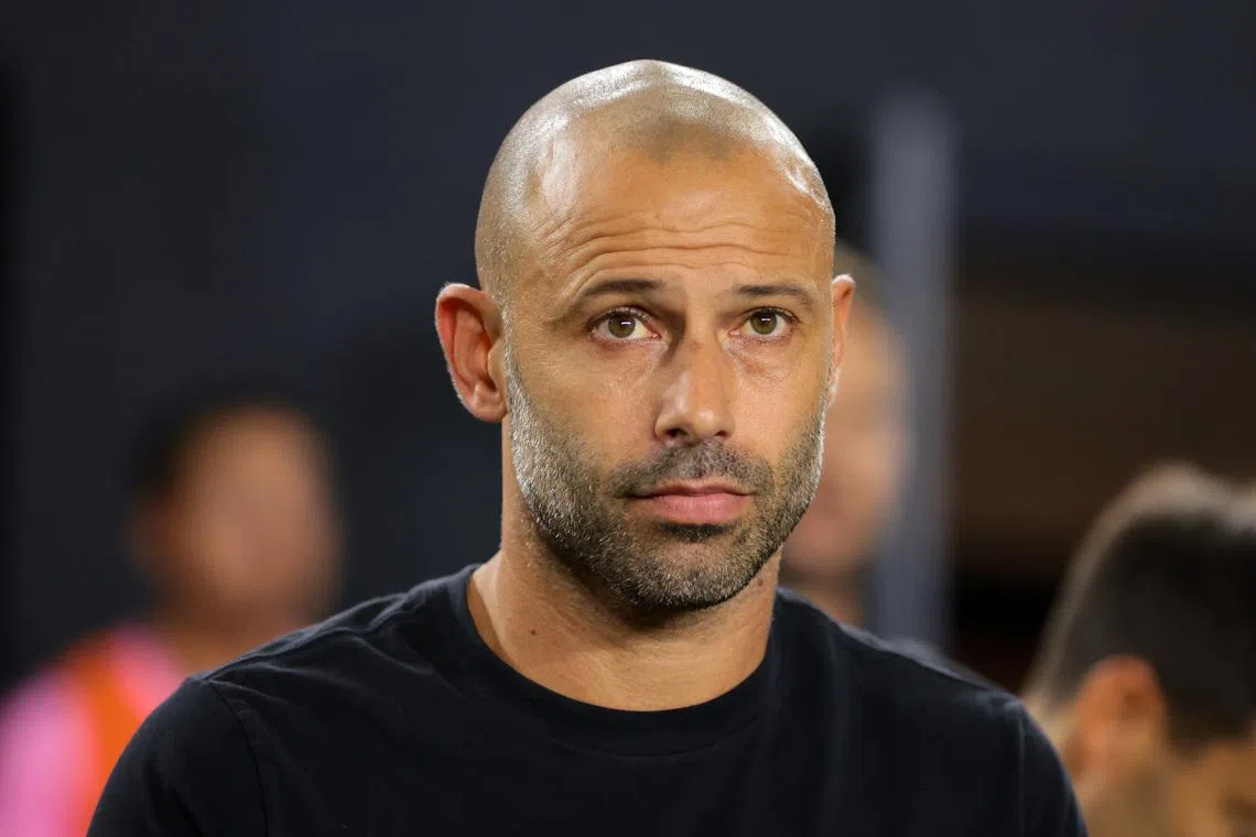 Oct 4, 2025; Fort Lauderdale, Florida, USA; Inter Miami CF head coach Javier Mascherano looks on from the bench before the game against the New England Revolution at Chase Stadium. Mandatory Credit: Sam Navarro-Imagn Images