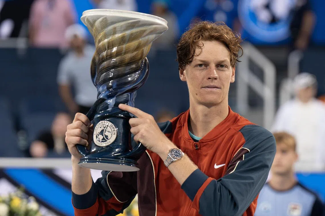 Jannik Sinner posing with his trophy after beating Frances Tiafoe to win the Cincinnati Open, in the build-up to the US Open.