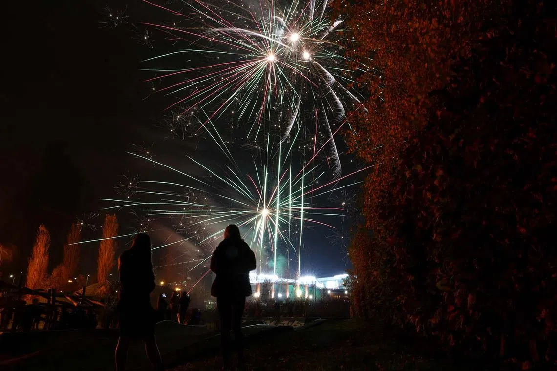 Fireworks are seen on Bonfire Night before a Champions League football match between Celtic and RB Leipzig, at Celtic Park, Glasgow, Scotland, on Nov 5, 2024.