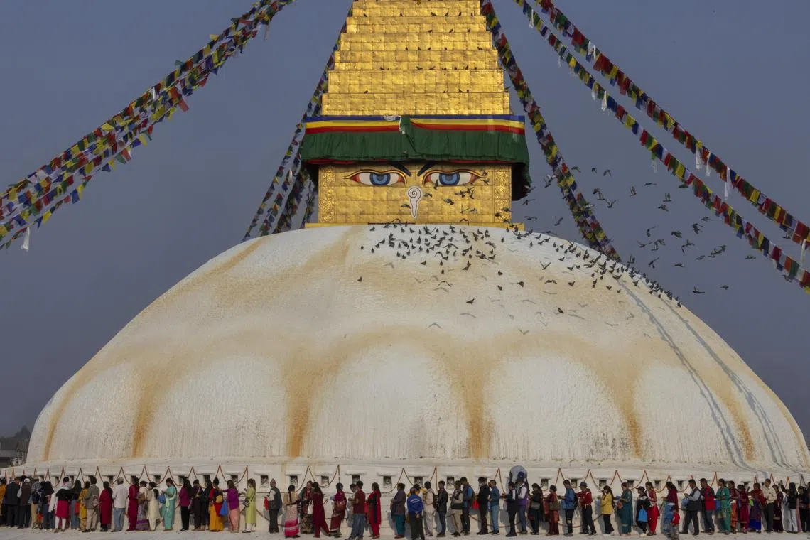 Nepalese people from the Tamang community visit the Bauddhanath Stupa to observe the Temal festival in Kathmandu, Nepal, on 22 April 2024. Thousands of people from across the country gathered at the Bauddhanath Stupa to pay homage to their loved ones who have passed away.