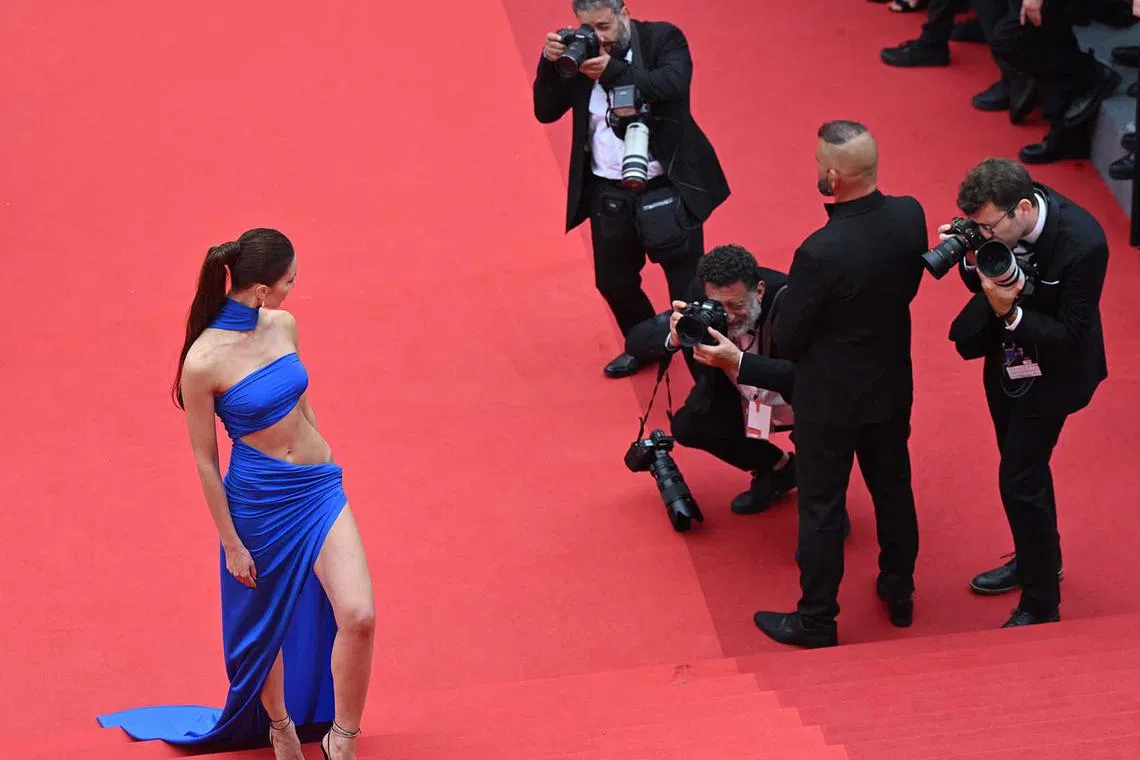 Polish model Sabina Jakubowicz arrives for the screening of the film "Kaibutsu" (Monster) during the 76th edition of the Cannes Film Festival in Cannes, southern France, on May 17.