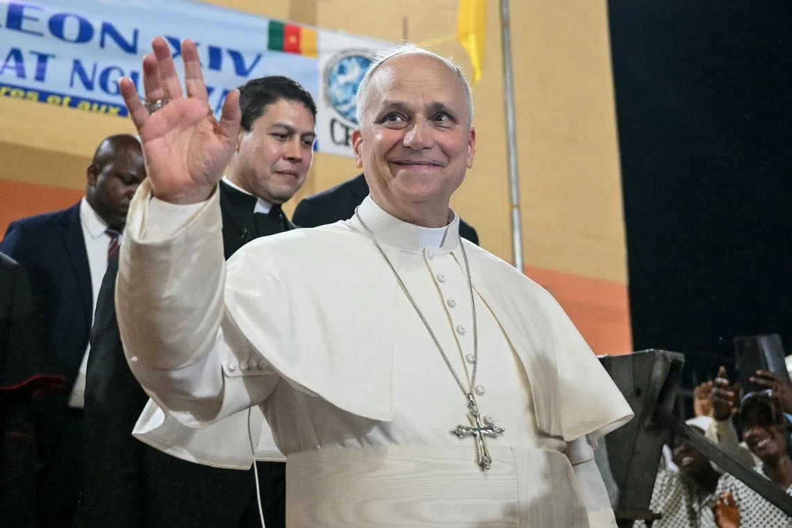 Pope Leo XIV waves to supporters as he leaves after his visit to the Ngul Zamba (Power of God) orphanage in Yaounde, Cameroon, during an apostolic journey to Africa, on April 15, 2026.     ALBERTO PIZZOLI/Pool via REUTERS