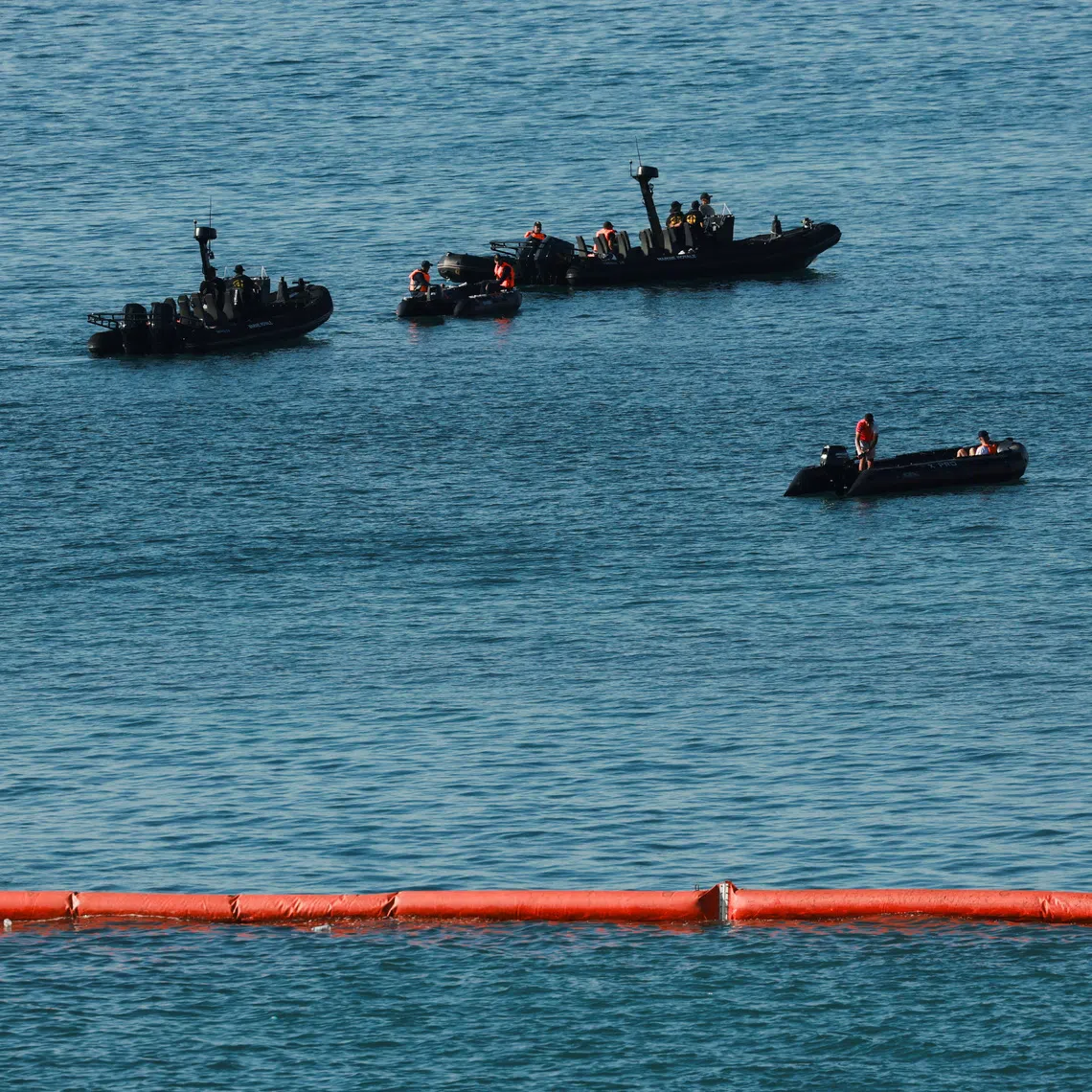 Members of the Royal Moroccan Navy patrol on the Moroccan side of the floating barrier off the border as seen from Ceuta, Spain, on Aug 2, 2026.