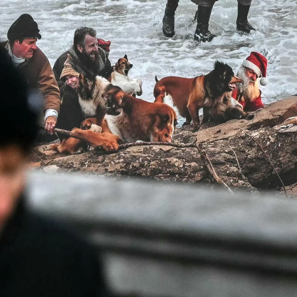 A disturbing array of figures in the festive mural included a Father Christmas with a pained expression and a beard that is half orange and half white.