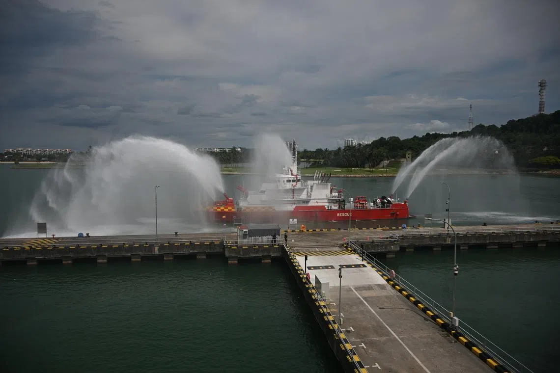 The official opening of the new SCDF Marine Division Headquarters featured a parade, plaque unveiling and water curtain demonstration by an SCDF vessel.