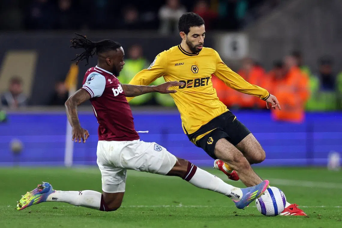 Wolves ease relegation worries with 1-0 win over West Ham | The Straits ...