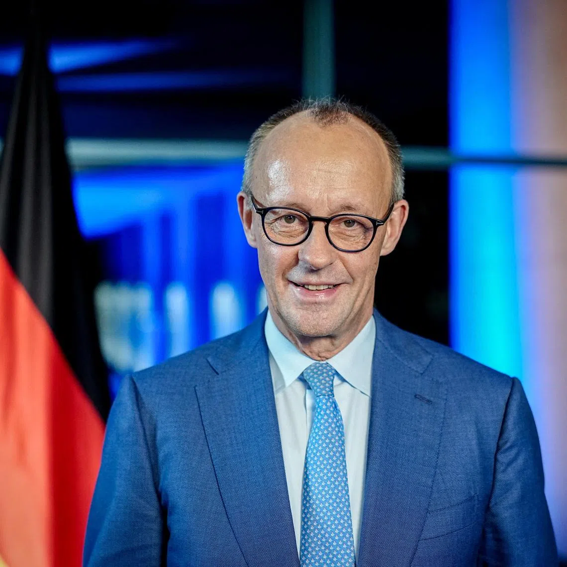 German Chancellor Friedrich Merz poses before the recording of his New Year's speech at the Chancellery in Berlin, Germany, December 19, 2025.   Kay Nietfeld/Pool via REUTERS