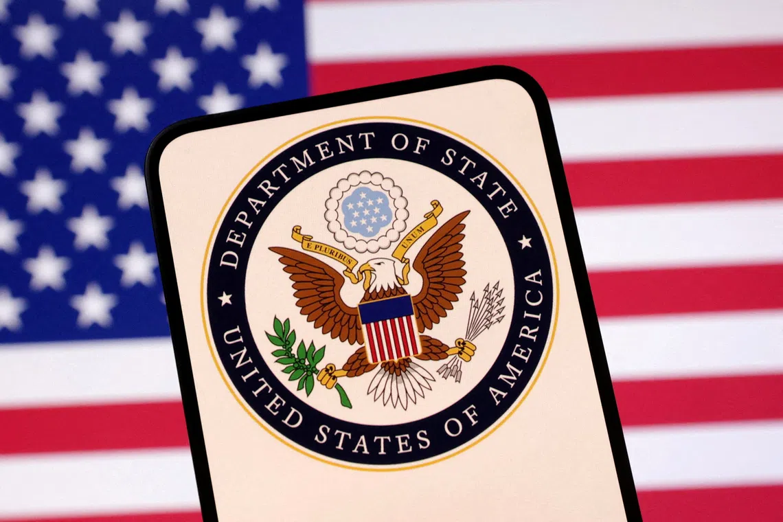 FILE PHOTO: United States Department of State logo and U.S. flag are seen in this illustration created on April 23, 2025. REUTERS/Dado Ruvic/Illustration/File Photo