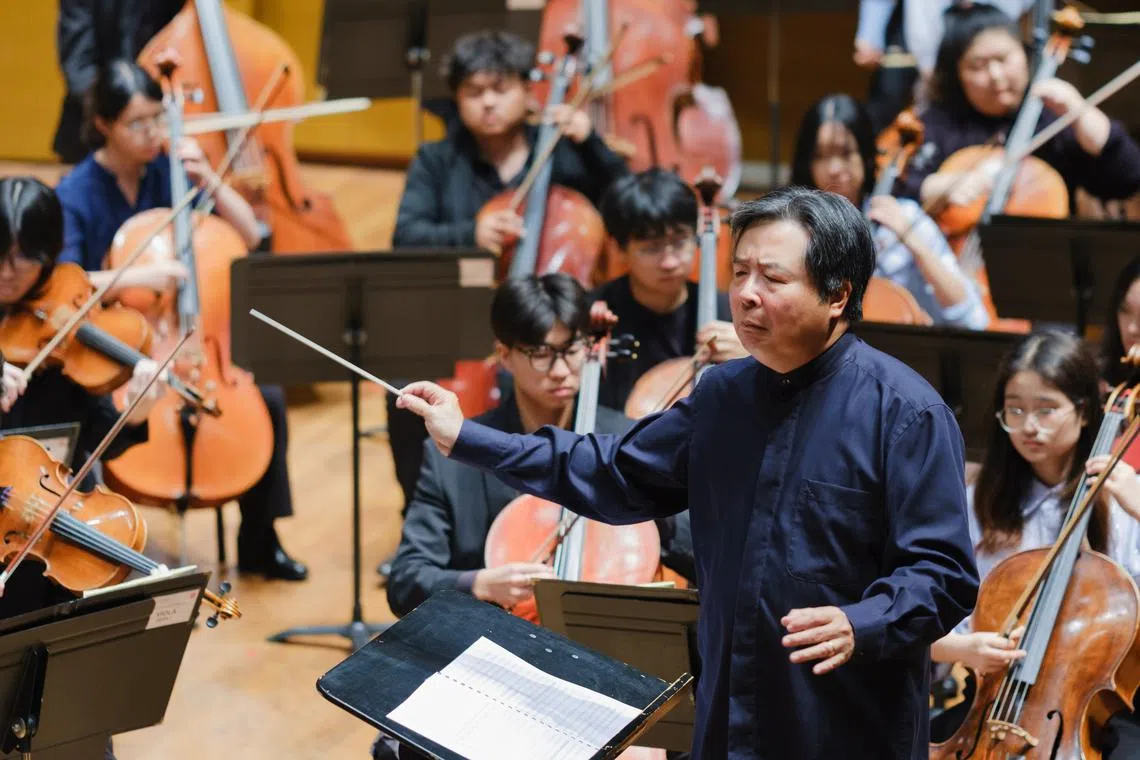 Conductor Chan Tze Law helmed this first collaboration between the YST Orchestral Institute and the National University of Singapore Symphony Orchestra. 