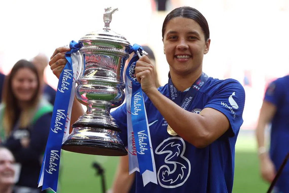 Soccer Football - Women's FA Cup - Final - Chelsea v Manchester United - Wembley Stadium, London, Britain - May 14, 2022 Chelsea's Sam Kerr celebrates with the trophy after winning the Women's FA Cup Action Images via Reuters/Paul Childs