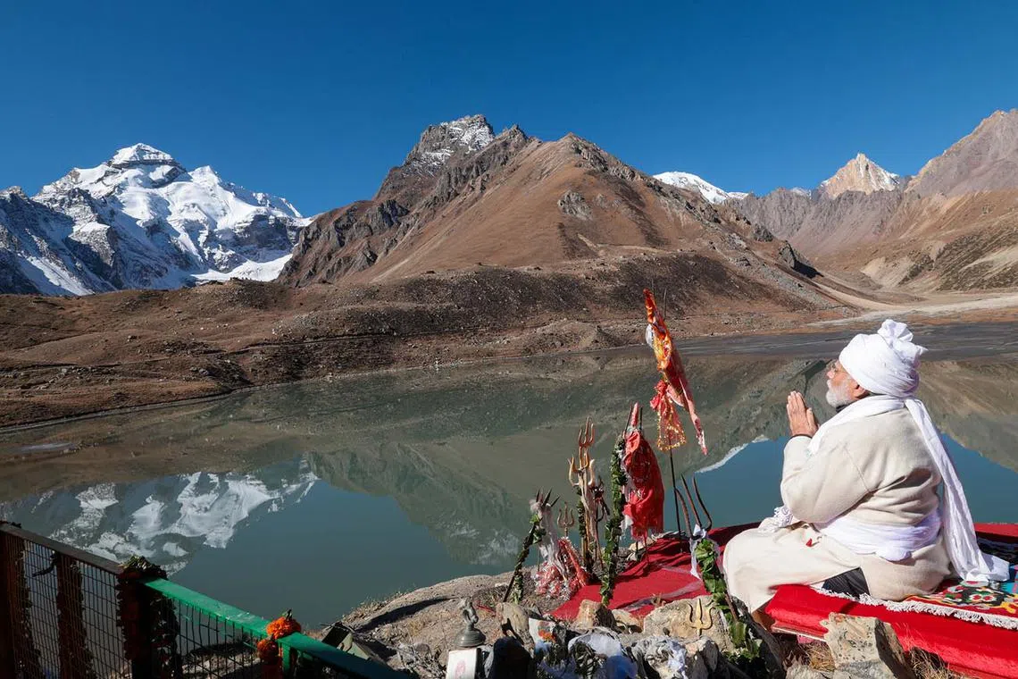 Indian prime minister Narendra Modi performing rituals and Pooja (Hindu prayer) at the Parvati Kund in Uttarakhand, India, Oct 12. 