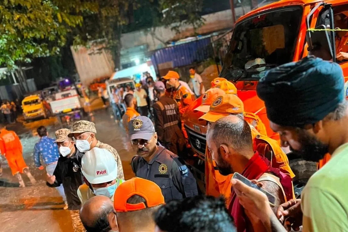 Rescue efforts were being hampered by mud and water built up inside the tunnel, as well as breathing issues due to the suspected gas leak.