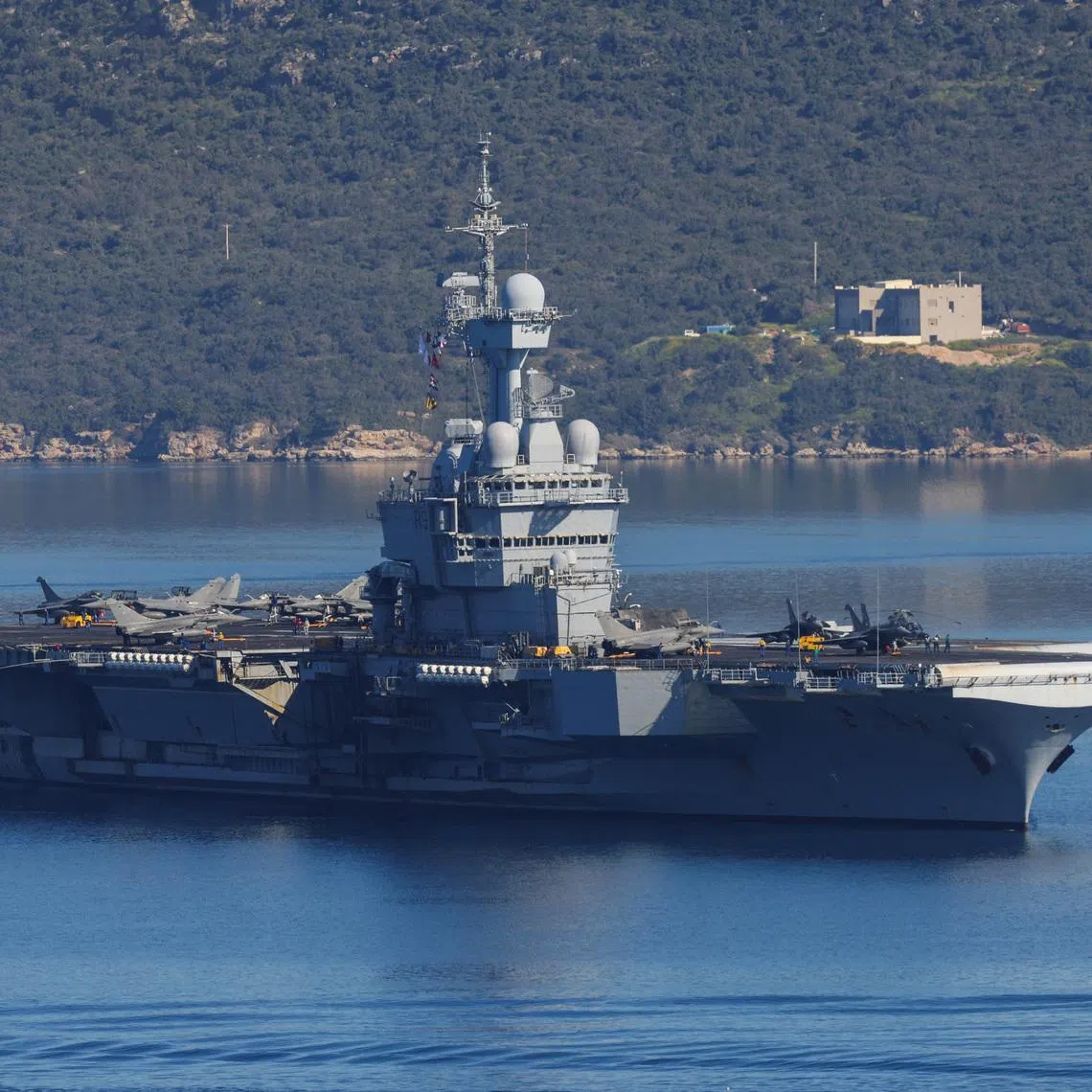 French aircraft carrier Charles De Gaulle departs from Souda Bay, on the island of Crete, Greece, April 7, 2026. REUTERS/Stefanos Rapanis