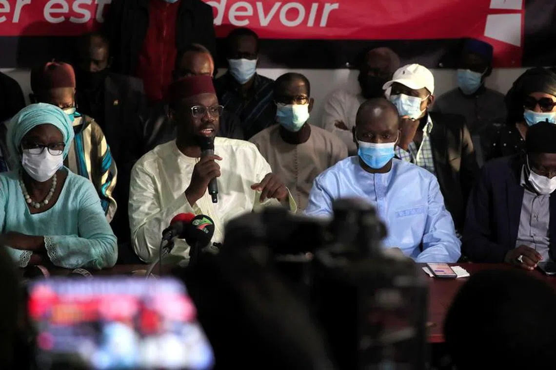 Opposition leader Ousmane Sonko, who was arrested on sexual assault accusations and released on bail under judicial supervision, speaks during a news conference in Dakar, Senegal March 8, 2021. REUTERS/Cooper Inveen/File Photo