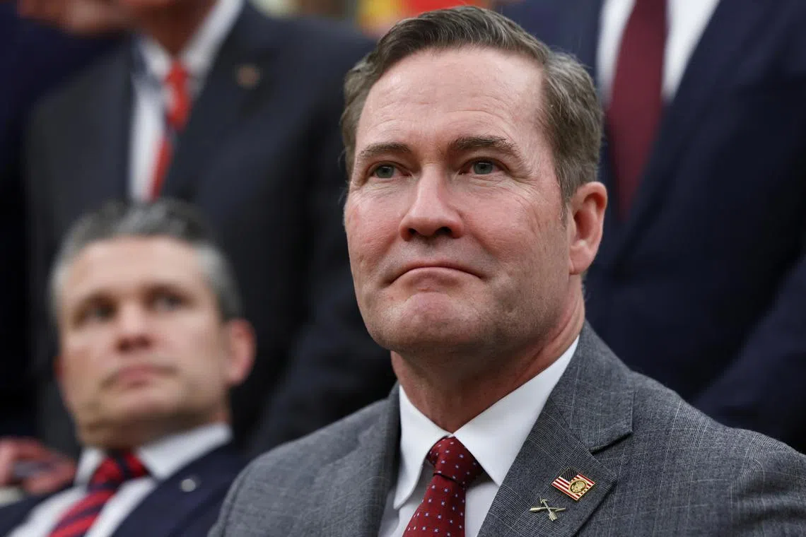 U.S. National Security Advisor Mike Waltz looks on as he sits next to U.S. Defense Secretary Pete Hegseth, while U.S. President Donald Trump (not pictured) meets with NATO Secretary General Mark Rutte (not pictured), in the Oval Office at the White House in Washington, D.C., U.S., March 13, 2025. REUTERS/Evelyn Hockstein