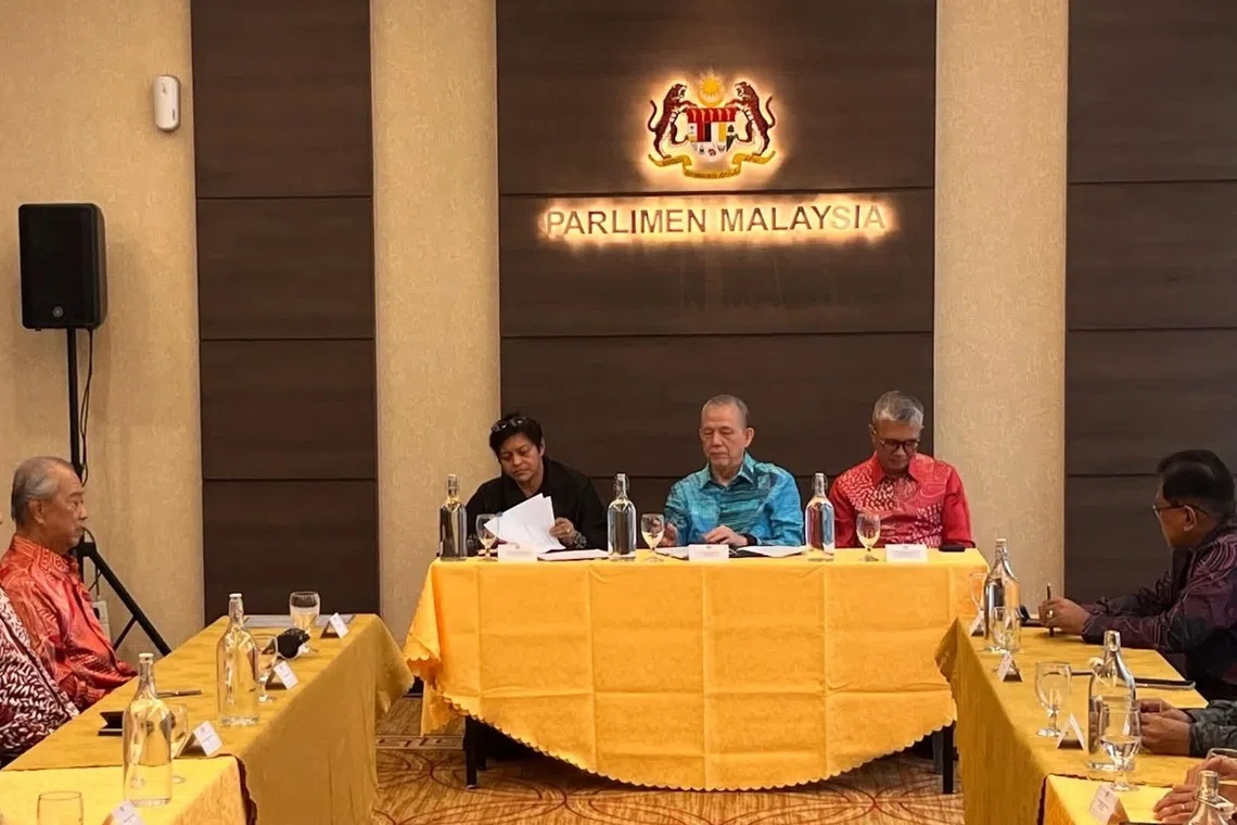 Deputy Prime Minister Fadillah Yusof (centre) signed a confidence and supply agreement with 12 Opposition MPs on Oct 29.