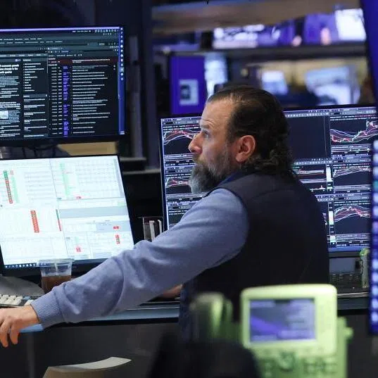 A trader works on the floor of the New York Stock Exchange at the opening bell on Feb 20, 2026.