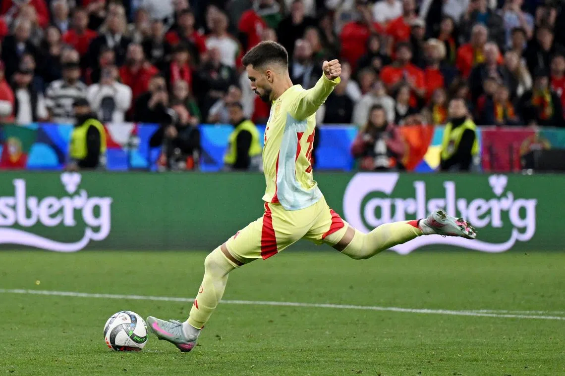 Soccer Football - Nations League - Final - Portugal v Spain - Allianz Arena, Munich, Germany - June 8, 2025 Spain's Alex Baena scores a penalty during the penalty shootout REUTERS/Angelika Warmuth/File Photo