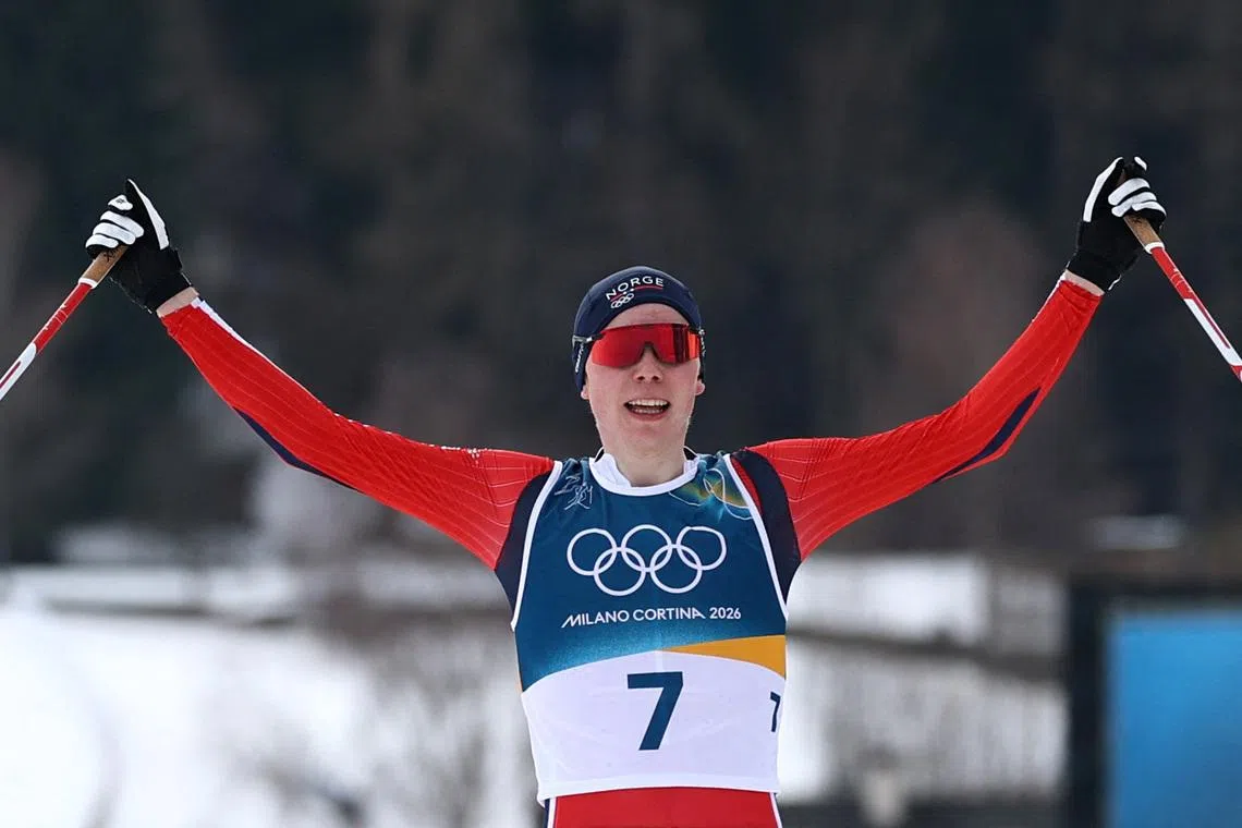 Milano Cortina 2026 Olympics - Nordic Combined - Individual Gundersen Normal Hill/10km, Cross-Country - Tesero Cross-Country Skiing Stadium, Lago, Italy - February 11, 2026. Jens Luraas Oftebro of Norway celebrates as he crosses the finish line to win the gold medal REUTERS/Kai Pfaffenbach