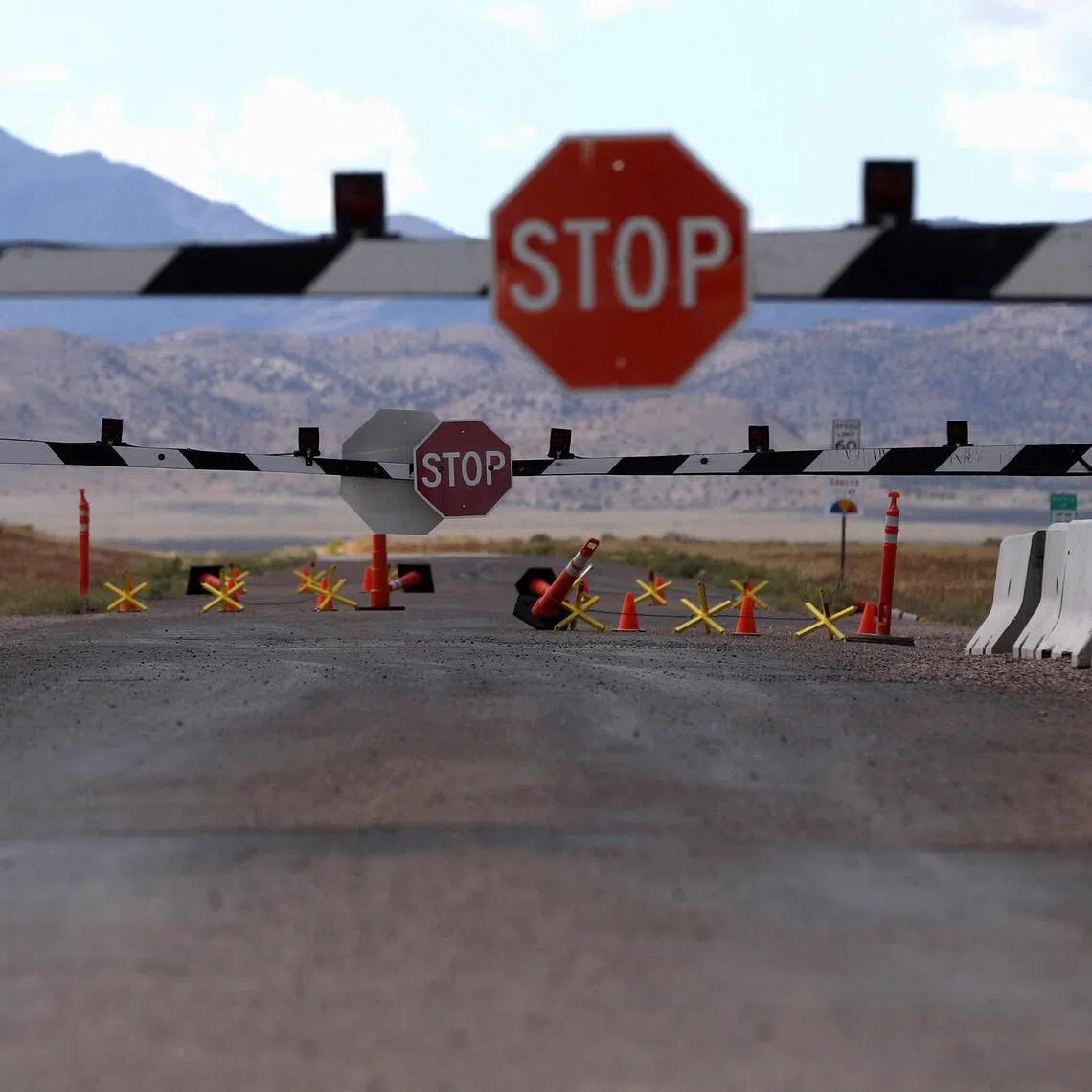 Closed gates at the entrance to Area 51, a secretive US military base believed to hold government secrets about extraterrestrials.