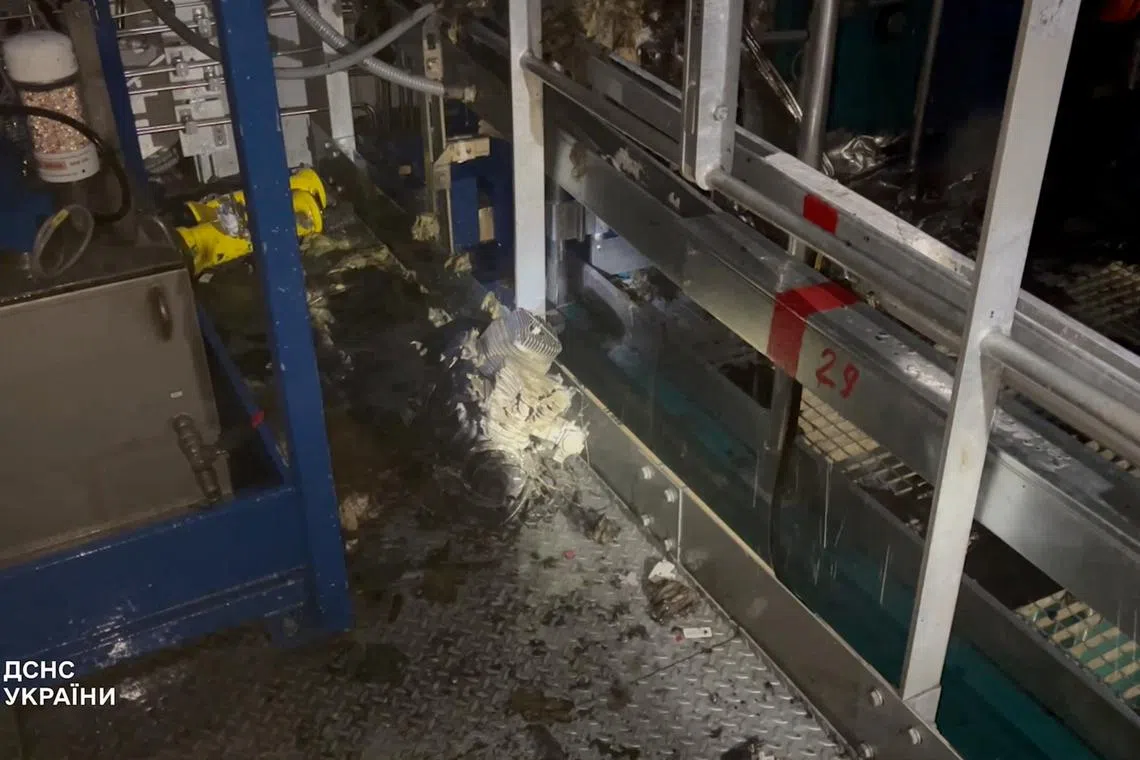 Interior of the structure that covers the old sarcophagus which confines the remains of the damaged fourth reactor of the Chornobyl Nuclear Power Plant, bears an impact of what the Ukrainian President Volodymyr Zelenskiy says was a Russian drone strike, amid Russia's attack on Ukraine, at Chornobyl, in Kyiv region, Ukraine February 14, 2025 in this screengrab taken from a handout video. Ukrainian Presidential Press Service/Handout via REUTERS