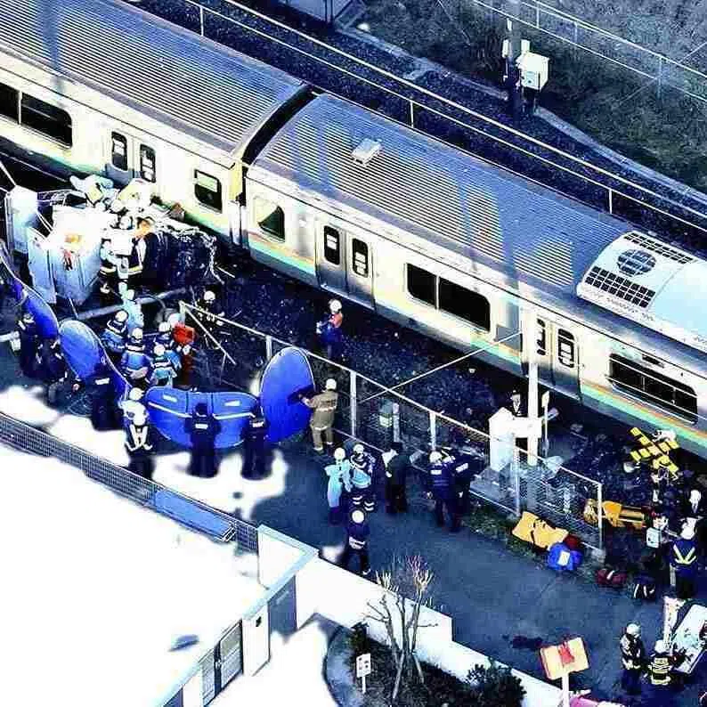 A train that collided with a car is seen near a level crossing in Shiraoka, Saitama Prefecture, on Jan 1, 2026.