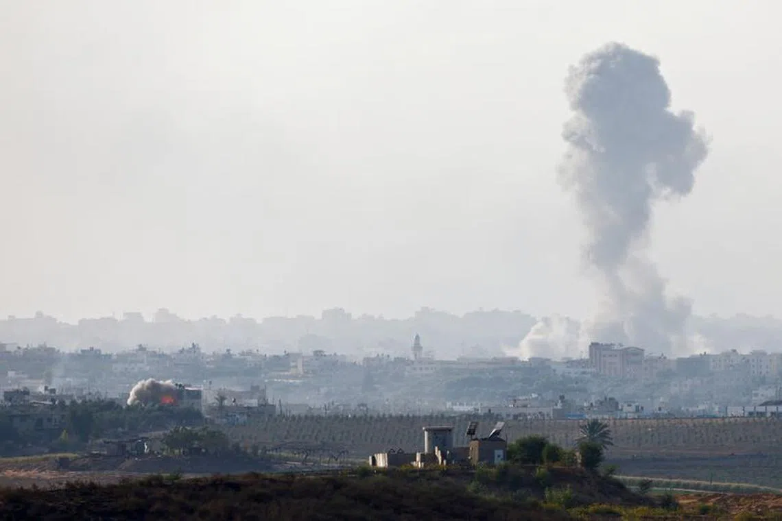 Smoke billows after rockets were launched from the Gaza Strip to Israel, as seen from Israel, October 30, 2023. REUTERS/Amir Cohen
