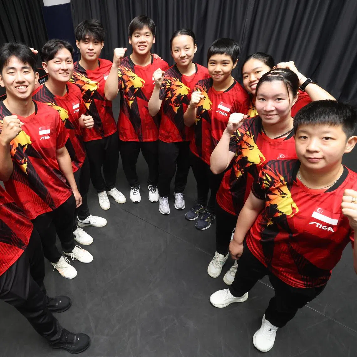 Singapore’s table tennis players (clockwise from left) Josh Chua, Koen Pang, Clarence Chew, Ellsworth Le, Izaac Quek, Ser Lin Qian, Loy Ming Ying, Tan Zhao Yun, Chloe Lai and Zeng Jian are aiming for a breakthrough at the Sept 19-Oct 4 Asian Games after failing to win a medal in the 2022 edition.