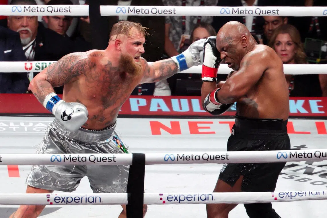 FILE PHOTO: Nov 15, 2024; Arlington, Texas, UNITED STATES;  Mike Tyson (black gloves) fights Jake Paul (silver gloves) at AT&T Stadium. Mandatory Credit: Kevin Jairaj-Imagn Images/File Photo