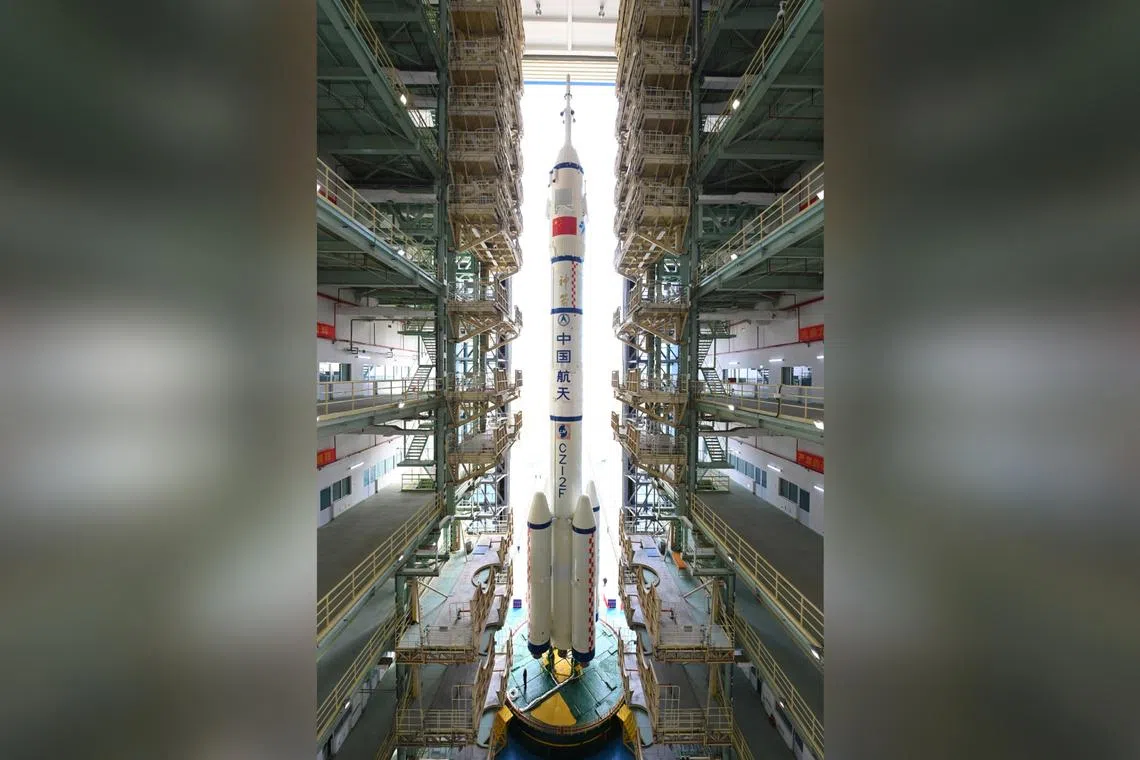 The Long March-2F rocket, carrying the Shenzhou-15 spacecraft, being transferred to the launching area at Jiuquan Satellite Launch Centre in China's Gansu province on Nov 21, 2022. 