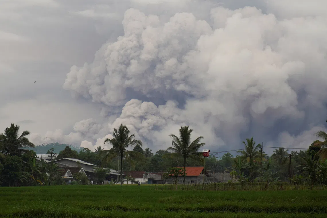 Mount Semeru volcano spews volcanic material during an eruption as seen from Sumbermujur village in Lumajang, East Java province, Indonesia, on Nov 19. 