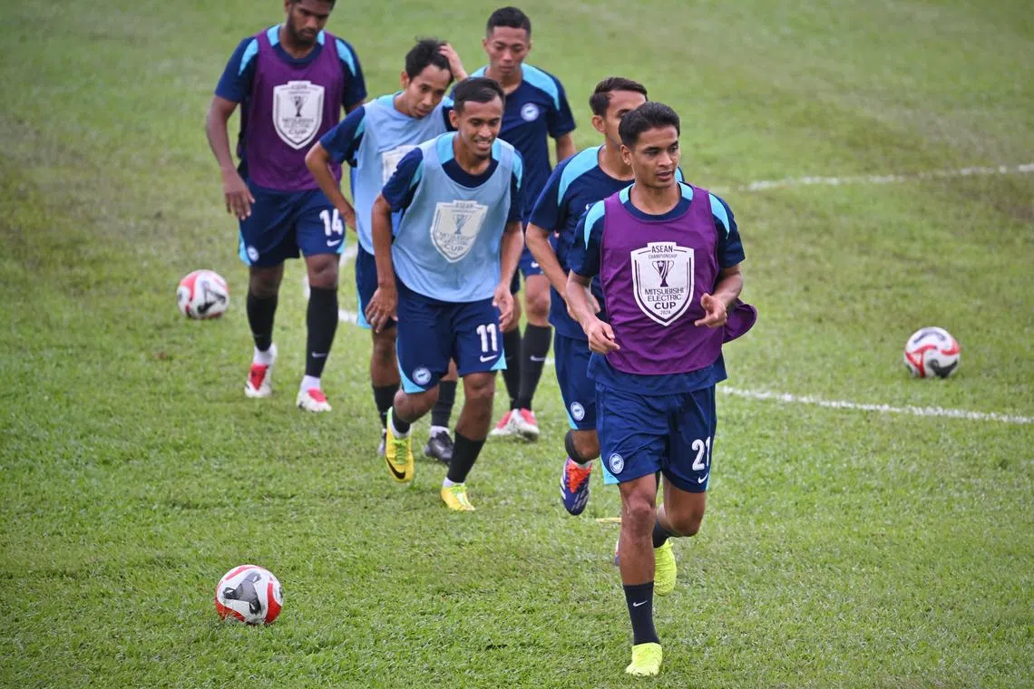 Defender Safuwan Baharudin (front) during a Singapore national team training session at Multimedia University in Kuala Lumpur on Dec 19. After missing the Lions' 4-2 Asean Championship loss on Dec 17 owing to club commitments, the veteran is back in contention to face Malaysia on Dec 20.
