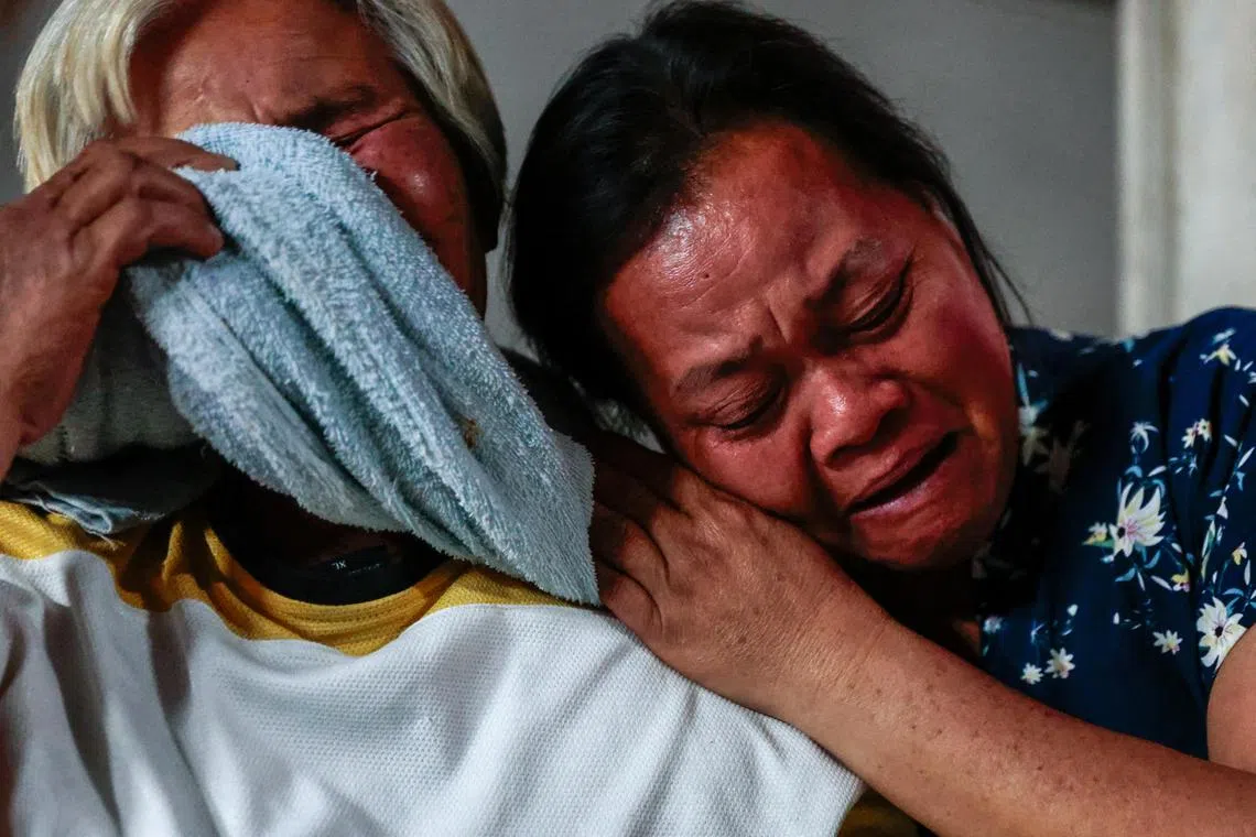 Wiwwaro Sriaoun, 53, mother of Thai hostage Watchara Sriaoun who was captured during the deadly October 7, 2023 attack by Hamas, reacts with her relative as her son is released from Gaza, at her house in Kut Yang village, Udon Thani province, Thailand, January 30, 2025. REUTERS/Napat Wesshasartar