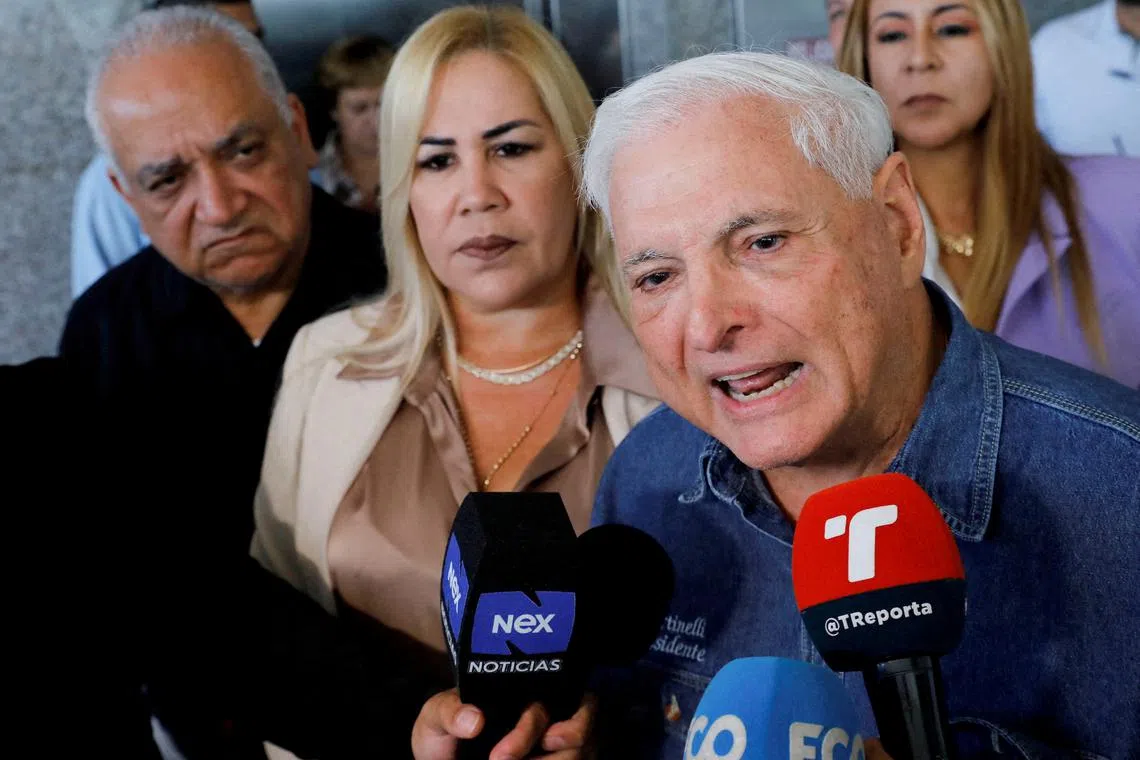 FILE PHOTO: Panama's former President Ricardo Martinelli addresses the media, accompanied by his lawyer Shirley Castaneda, after filing a complaint with the General Secretariat of the National Assembly to investigate Panamanian President Laurentino Cortizo and Vice President Jose Gabriel Carrizo in Panama City, Panama, February 6, 2024. REUTERS/Aris Martinez/File Photo
