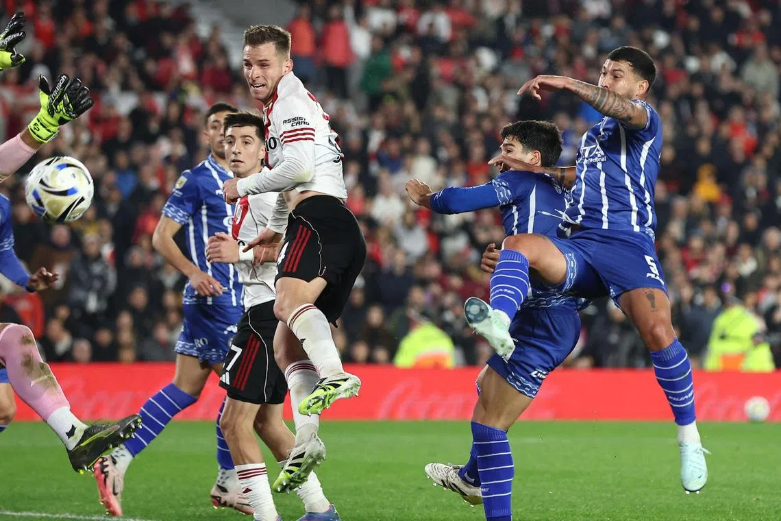 River Plate midfielder Giuliano Galoppo (centre) heading in his team's third goal in the Argentine Professional Football League 2025 Clausura Tournament match against Godoy Cruz at MAS Monumental Stadium in Buenos Aires on Aug 17, 2025.