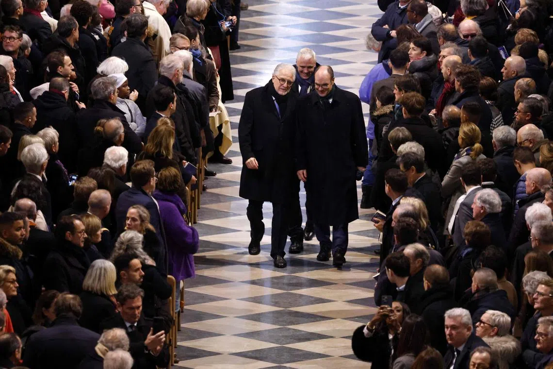 Mr Chems-Eddine Hafiz (left), rector of the Grand Mosque of Paris, arriving for Notre Dame Cathedral's opening ceremony in Paris, on Dec 8, 2024.