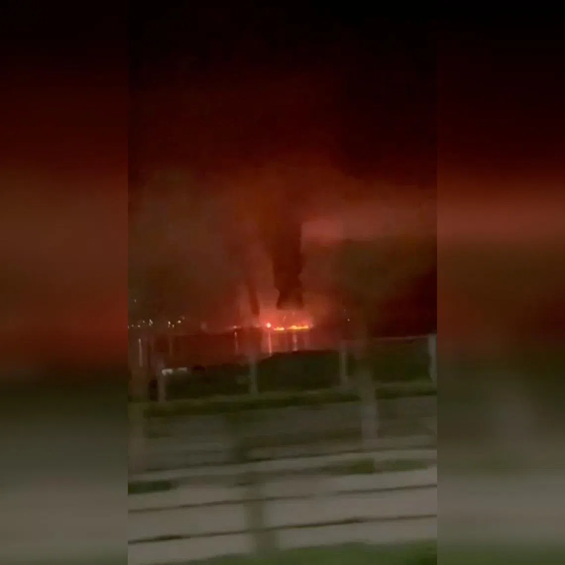 A video screengrab shows smoke and flames, following a drone attack in Novorossiysk, Russia.