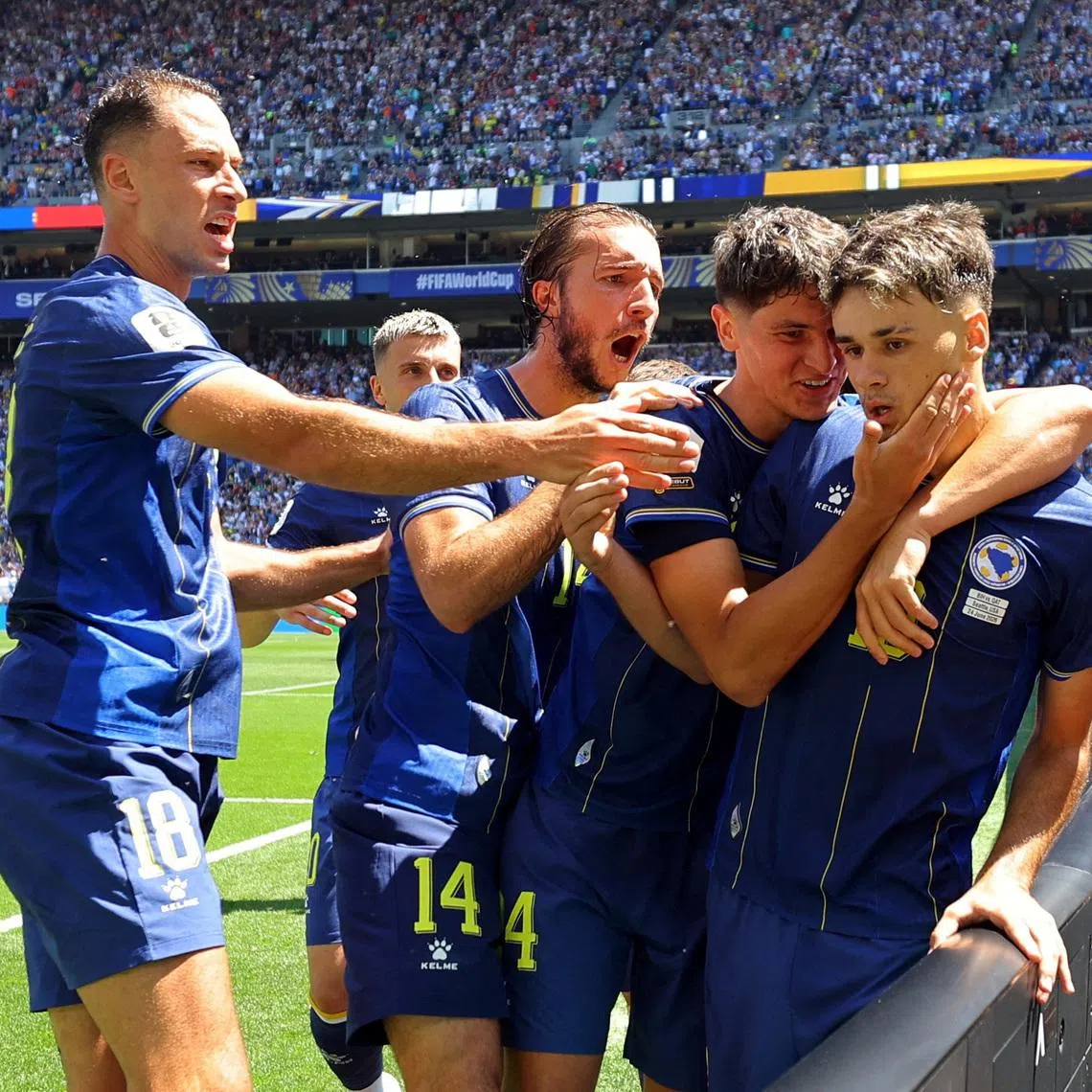 Soccer Football - FIFA World Cup 2026 - Group B - Bosnia and Herzegovina v Qatar - Seattle Stadium, Seattle, Washington, U.S. - June 24, 2026 Bosnia and Herzegovina's Kerim Alajbegovic celebrates scoring their first goal with teammates REUTERS/Carlos Barria
